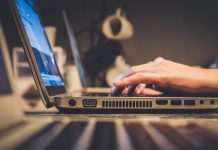 How Digital Entertainment Changed Online Gambling person using silver laptop computer on desk