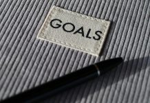 Changing a Goal Is Not Always Quitting black and silver pen on gray textile