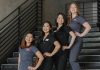 Visual Identity Should Support Lived Identity a group of women standing on top of a set of stairs